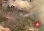 Image of American bombardment of Viet Cong positions Bien Hoa Vietnam, 1965, second 50 stock footage video 65675054870