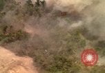Image of American bombardment of Viet Cong positions Bien Hoa Vietnam, 1965, second 51 stock footage video 65675054870