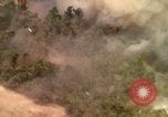 Image of American bombardment of Viet Cong positions Bien Hoa Vietnam, 1965, second 52 stock footage video 65675054870