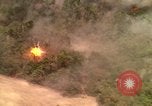Image of American bombardment of Viet Cong positions Bien Hoa Vietnam, 1965, second 54 stock footage video 65675054870