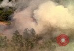 Image of American bombardment of Viet Cong positions Bien Hoa Vietnam, 1965, second 57 stock footage video 65675054870