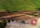 Image of American bombardment of Viet Cong positions Bien Hoa Vietnam, 1965, second 60 stock footage video 65675054870