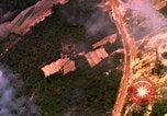 Image of bombardment of target areas Bien Hoa Vietnam, 1965, second 33 stock footage video 65675054871