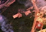 Image of bombardment of target areas Bien Hoa Vietnam, 1965, second 34 stock footage video 65675054871
