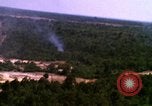 Image of bombardment of target areas Bien Hoa Vietnam, 1965, second 16 stock footage video 65675054873