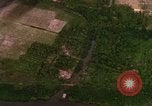 Image of Viet Cong huts bombed Bien Hoa Vietnam, 1965, second 1 stock footage video 65675054875