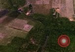 Image of Viet Cong huts bombed Bien Hoa Vietnam, 1965, second 3 stock footage video 65675054875