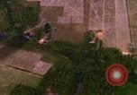 Image of Viet Cong huts bombed Bien Hoa Vietnam, 1965, second 4 stock footage video 65675054875