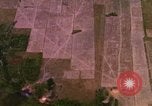 Image of Viet Cong huts bombed Bien Hoa Vietnam, 1965, second 6 stock footage video 65675054875