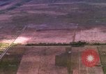 Image of Viet Cong huts bombed Bien Hoa Vietnam, 1965, second 9 stock footage video 65675054875