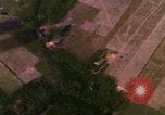 Image of Viet Cong huts bombed Bien Hoa Vietnam, 1965, second 11 stock footage video 65675054875
