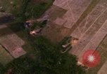 Image of Viet Cong huts bombed Bien Hoa Vietnam, 1965, second 12 stock footage video 65675054875