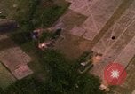 Image of Viet Cong huts bombed Bien Hoa Vietnam, 1965, second 13 stock footage video 65675054875