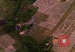 Image of Viet Cong huts bombed Bien Hoa Vietnam, 1965, second 15 stock footage video 65675054875