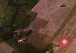 Image of Viet Cong huts bombed Bien Hoa Vietnam, 1965, second 16 stock footage video 65675054875