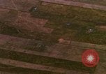 Image of Viet Cong huts bombed Bien Hoa Vietnam, 1965, second 26 stock footage video 65675054875