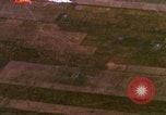 Image of Viet Cong huts bombed Bien Hoa Vietnam, 1965, second 27 stock footage video 65675054875