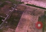 Image of Viet Cong huts bombed Bien Hoa Vietnam, 1965, second 12 stock footage video 65675054876