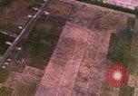 Image of Viet Cong huts bombed Bien Hoa Vietnam, 1965, second 14 stock footage video 65675054876
