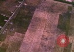 Image of Viet Cong huts bombed Bien Hoa Vietnam, 1965, second 15 stock footage video 65675054876