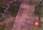 Image of Viet Cong huts bombed Bien Hoa Vietnam, 1965, second 16 stock footage video 65675054876