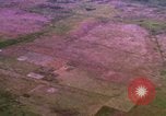 Image of Viet Cong huts bombed Bien Hoa Vietnam, 1965, second 19 stock footage video 65675054876