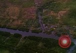 Image of Viet Cong huts bombed Bien Hoa Vietnam, 1965, second 28 stock footage video 65675054876