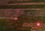 Image of Viet Cong huts bombed Bien Hoa Vietnam, 1965, second 38 stock footage video 65675054876