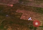 Image of Viet Cong huts bombed Bien Hoa Vietnam, 1965, second 42 stock footage video 65675054876