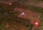 Image of Viet Cong huts bombed Bien Hoa Vietnam, 1965, second 43 stock footage video 65675054876