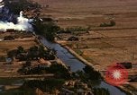 Image of Viet Cong huts bombed Soc Trang Vietnam, 1965, second 10 stock footage video 65675054877