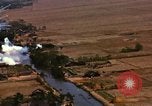Image of Viet Cong huts bombed Soc Trang Vietnam, 1965, second 13 stock footage video 65675054877