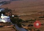 Image of Viet Cong huts bombed Soc Trang Vietnam, 1965, second 14 stock footage video 65675054877