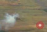 Standbild Luftbild des Viet Cong bombardiert Hütten Quang Duc Vietnam, 1965, aus Sekunde 18 historischem Filmmaterial Videoclip 65675054878