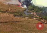 Standbild Luftbild des Viet Cong bombardiert Hütten Quang Duc Vietnam, 1965, aus Sekunde 50 historischem Filmmaterial Videoclip 65675054878