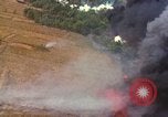 Standbild Luftbild des Viet Cong bombardiert Hütten Quang Duc Vietnam, 1965, aus Sekunde 58 historischem Filmmaterial Videoclip 65675054878