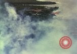 Image of Viet Cong huts bombed Vietnam, 1965, second 8 stock footage video 65675054887