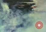 Image of Viet Cong huts bombed Vietnam, 1965, second 9 stock footage video 65675054887