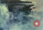 Image of Viet Cong huts bombed Vietnam, 1965, second 10 stock footage video 65675054887