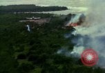 Image of Viet Cong huts bombed Vietnam, 1965, second 14 stock footage video 65675054887
