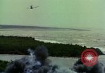 Image of Viet Cong huts bombed Vietnam, 1965, second 32 stock footage video 65675054887