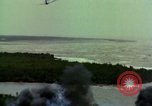 Image of Viet Cong huts bombed Vietnam, 1965, second 33 stock footage video 65675054887
