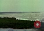 Image of Viet Cong huts bombed Vietnam, 1965, second 35 stock footage video 65675054887