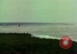 Image of Viet Cong huts bombed Vietnam, 1965, second 36 stock footage video 65675054887