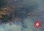 Image of Viet Cong huts bombed Vietnam, 1965, second 51 stock footage video 65675054887