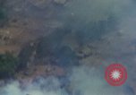Image of Viet Cong huts bombed Vietnam, 1965, second 52 stock footage video 65675054887