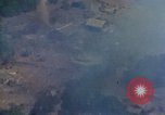 Image of Viet Cong huts bombed Vietnam, 1965, second 54 stock footage video 65675054887