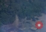 Image of Viet Cong huts bombed Vietnam, 1965, second 55 stock footage video 65675054887