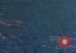Image of Viet Cong huts bombed Vietnam, 1965, second 56 stock footage video 65675054887