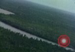 Image of Viet Cong huts bombed Vietnam, 1965, second 57 stock footage video 65675054887